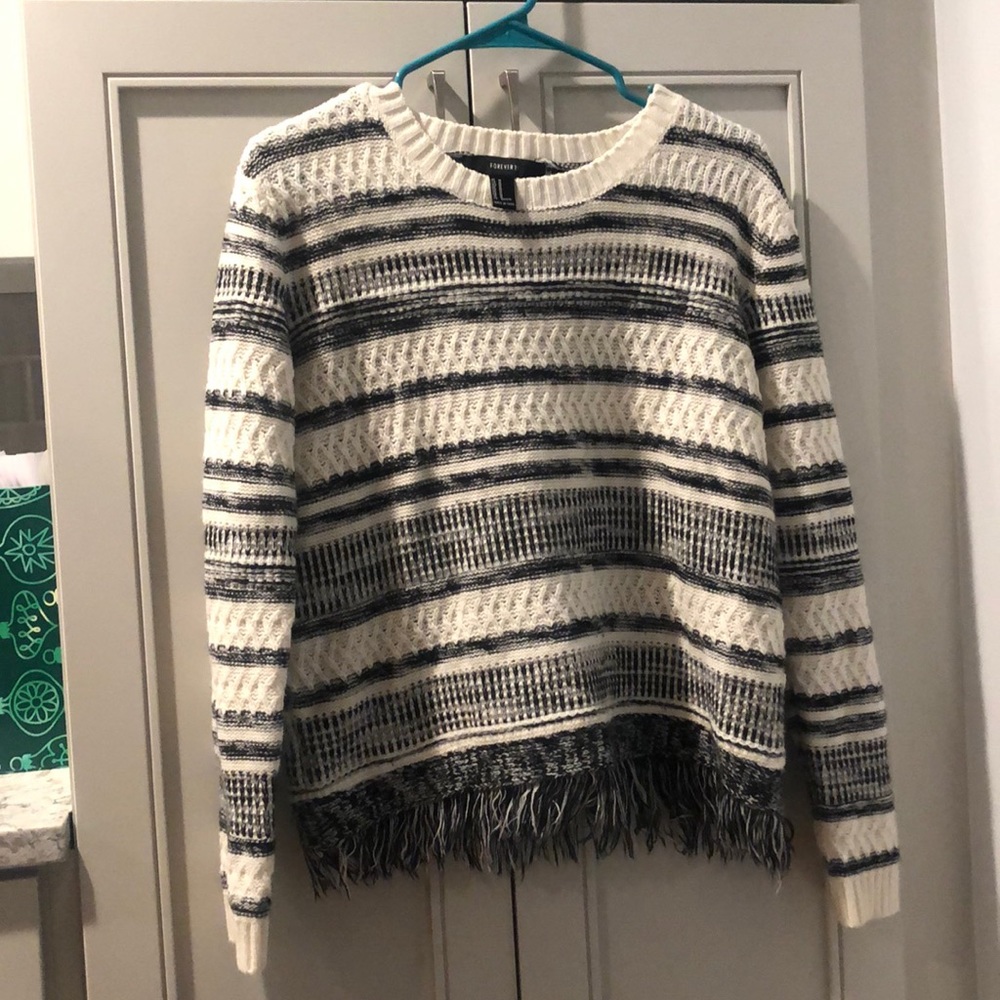 Striped and frayed sweater